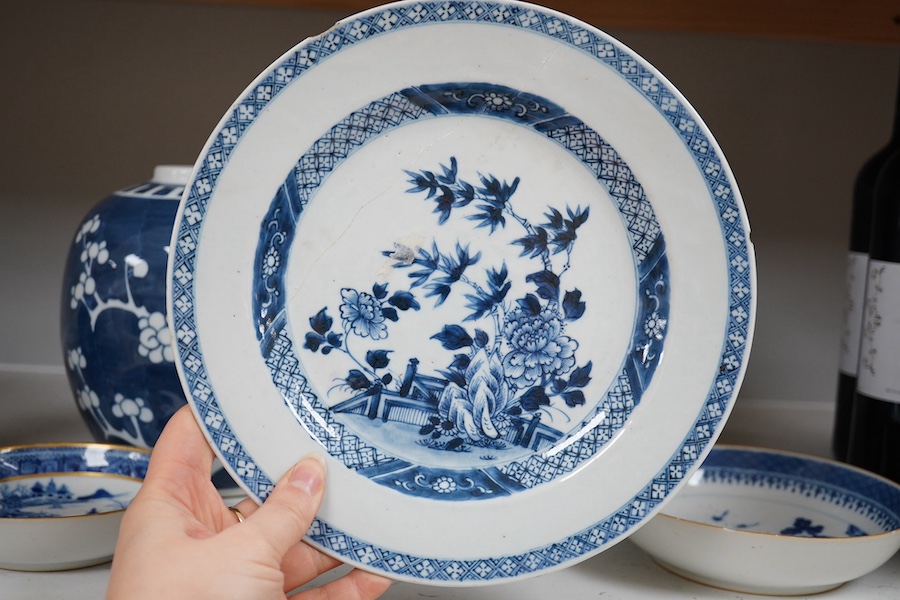 An 18th century Chinese export blue and white plate, together with two other dishes and two ginger jars. Condition - varies